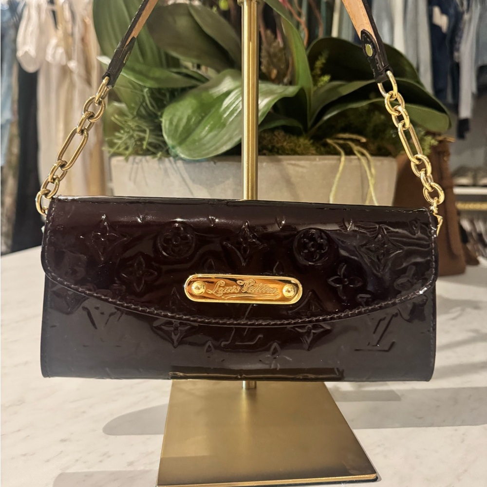 Louis Vuitton Burgandy Embossed Clutch with Gold Accents